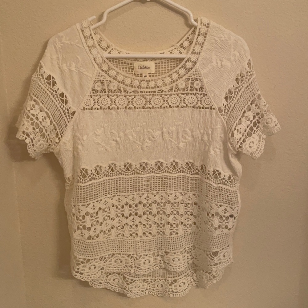 Crocheted oversized white tee.